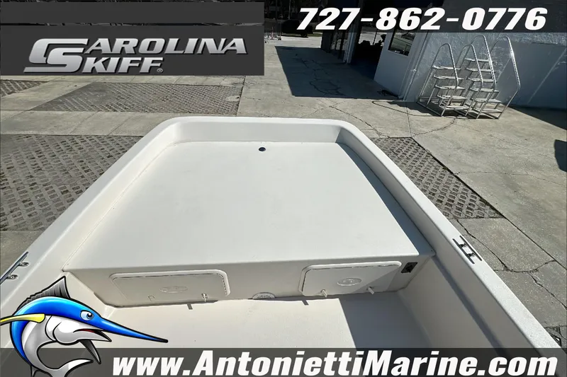 Slide: The Image of 2024 Carolina Skiff E21 DLX CC boat deck at Antonietti Marine dealership. - 22