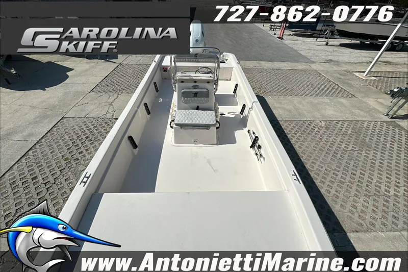 Slide: The Image of 2024 Carolina Skiff E21 DLX CC boat on display at Antonietti Marine. - 23