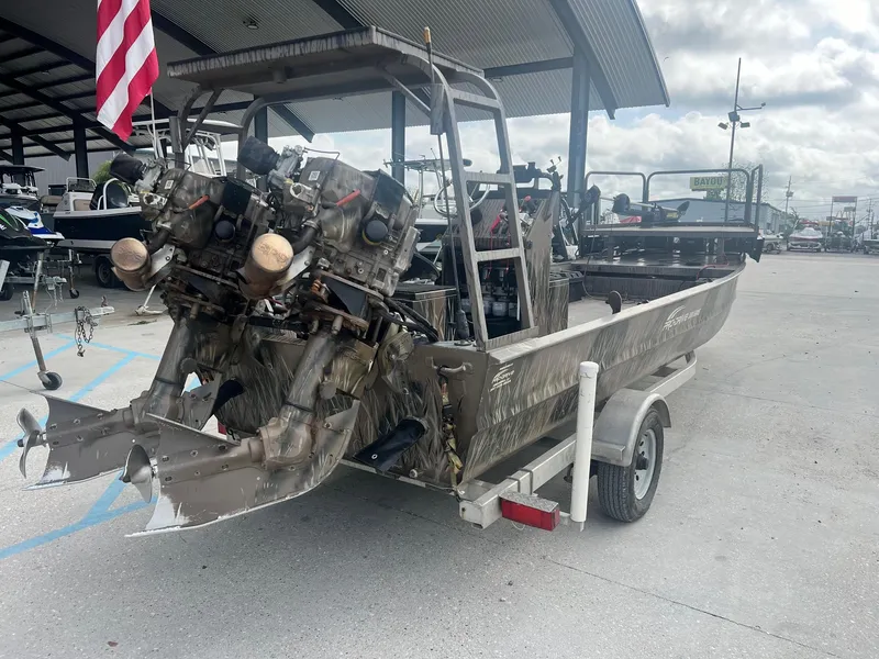 Slide: The Image of 2013 Pro-Drive 20 SBX boat with dual engines on a trailer. - 4