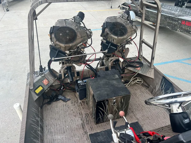 Slide: The Image of 2013 Pro-Drive 20 SBX boat with dual engines and control panel. - 6