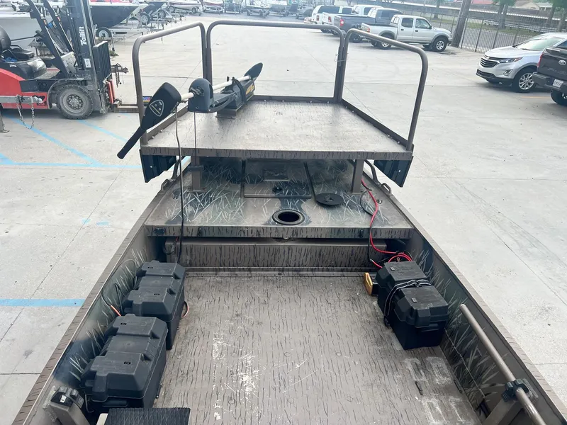 Slide: The Image of 2013 Pro-Drive 20 SBX boat interior with battery compartments and storage. - 9