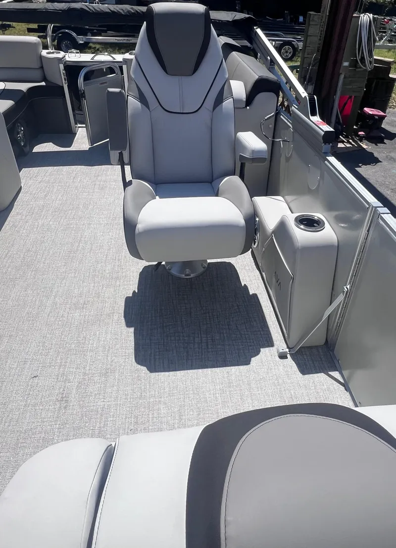 Slide: The Image of 2024 Avalon Catalina Quad Lounge 23' interior with luxurious seating and modern design. - 11