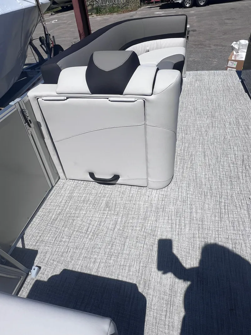 Slide: The Image of 2024 Avalon Catalina Quad Lounge 23' interior with luxurious seating and modern design. - 12