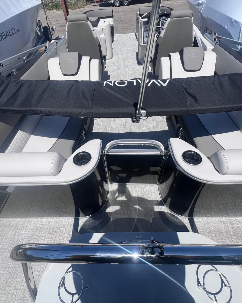 Slide: The Image of 2024 Avalon Catalina Quad Lounge 23' dashboard with Garmin navigation system. - 6
