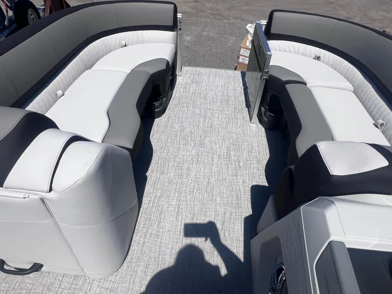 Slide: The Image of 2024 Avalon Catalina Quad Lounge 23' boat control panel and throttle. - 9