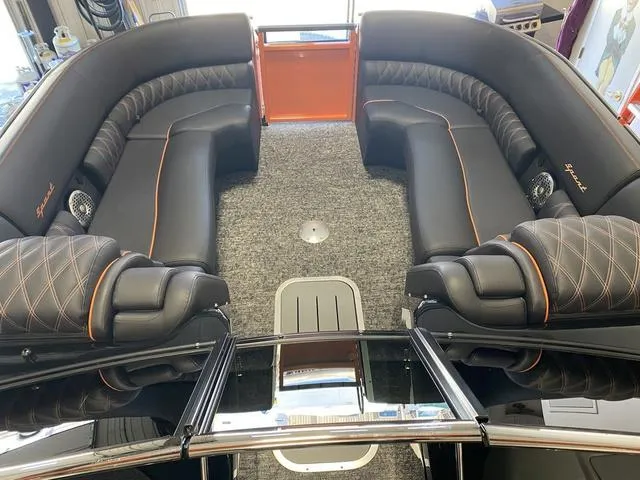 Slide: The Image of 2024 Bennington 27 QXFBWA T2 boat interior with luxurious seating and modern design. - 19