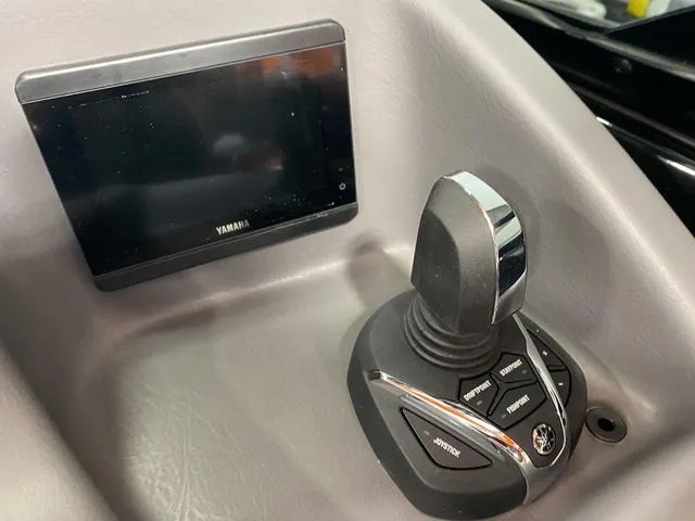 Slide: The Image of 2024 Bennington 27 QXFBWA T2 boat control panel with Yamaha joystick and display. - 22