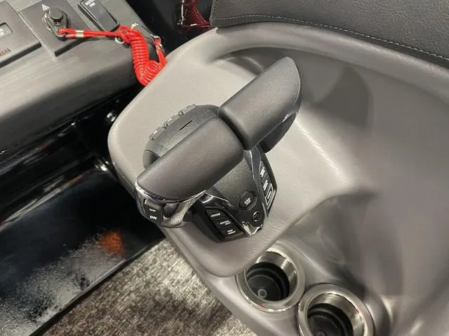 Slide: The Image of Throttle control of 2024 Bennington 27 QXFBWA T2 boat with dual cup holders. - 23