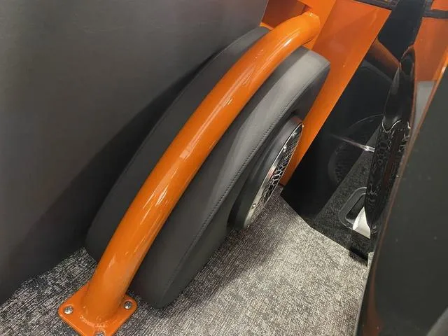 Slide: The Image of 2024 Bennington 27 QXFBWA T2 interior detail with orange and black accents. - 26