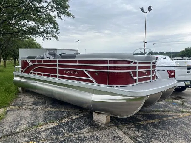 Slide: The Image of 2024 Bennington 22 SVSR pontoon boat with Yamaha outboard motor. - 3