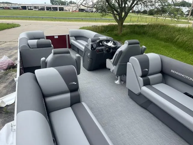 Slide: The Image of 2024 Bennington 22 SVSR pontoon boat with spacious seating and modern design. - 8