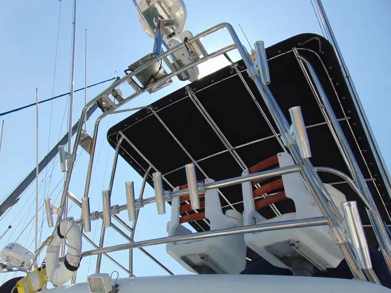 Slide: The Image of Rodman 1250 ADV Fisher Cruiser 2014, upper deck view with fishing rod holders. - 19