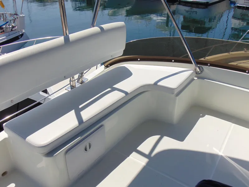 Slide: The Image of 2014 Rodman 1250 ADV Fisher Cruiser seating area on deck. - 22