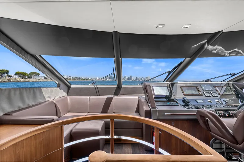 Slide: The Image of Interior helm of 2014 Sunseeker 75 Yacht with panoramic windows and modern controls. - 14