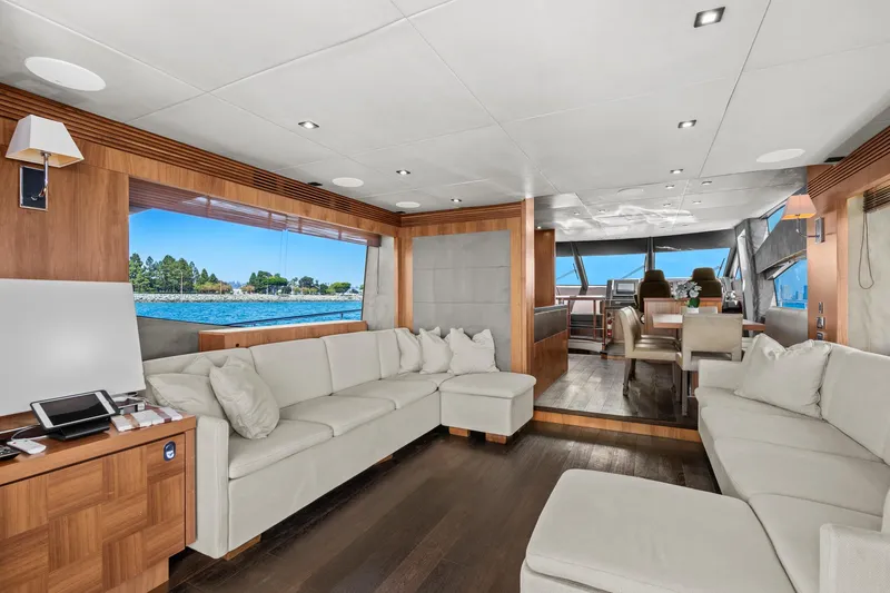 Slide: The Image of Luxurious interior of 2014 Sunseeker 75 Yacht with spacious seating and scenic window views. - 2