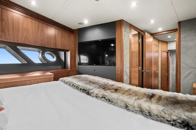 Slide: The Image of Luxurious bedroom interior of 2014 Sunseeker 75 Yacht with modern wood finishes and large TV. - 22