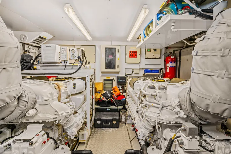 Slide: The Image of Engine room of a 2014 Sunseeker 75 Yacht with dual engines and equipment. - 41