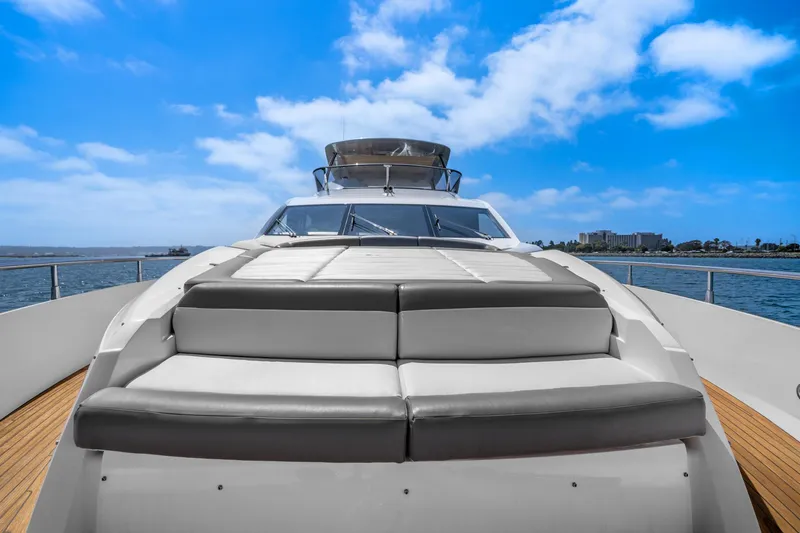 Slide: The Image of 2014 Sunseeker 75 Yacht on open water with clear blue sky. - 45