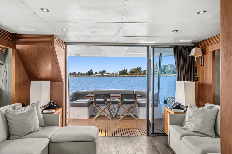 Slide: The Image of Interior of 2014 Sunseeker 75 Yacht with ocean view through sliding glass doors. - 6