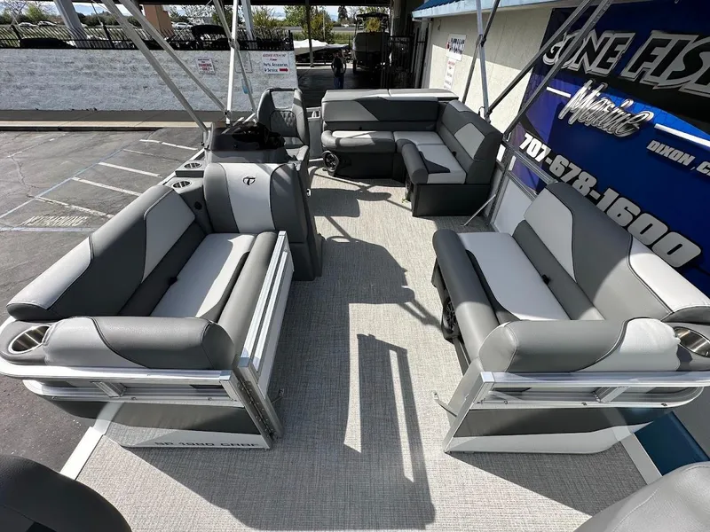 Slide: The Image of 2024 Tahoe Pontoon Sport Cruise Bow Fish interior with gray seating. - 14