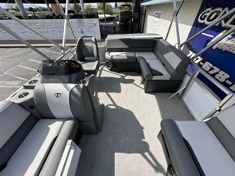 Slide: The Image of 2024 Tahoe Pontoon Sport Cruise Bow Fish interior with spacious seating and modern design. - 15