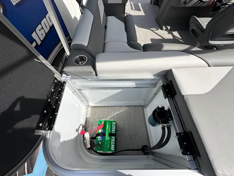 Slide: The Image of 2024 Tahoe Pontoon Sport Cruise Bow Fish battery compartment and seating area. - 29
