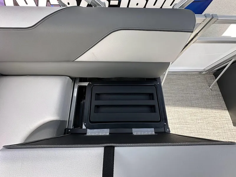 Slide: The Image of 2024 Tahoe Pontoon Sport Cruise Bow Fish seat storage compartment. - 32