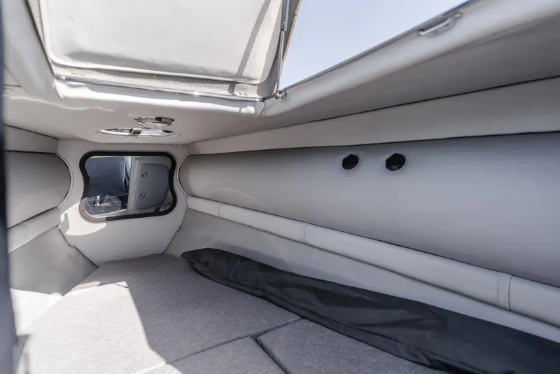 Slide: The Image of Interior cabin of 2019 Technohull 34 Sea DNA 999 boat with grey upholstery. - 13