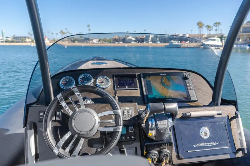 Slide: The Image of 2019 Technohull 34 Sea DNA 999 boat dashboard with navigation system and steering wheel. - 19