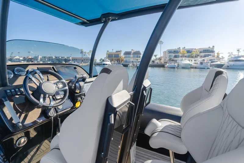 Slide: The Image of Interior of 2019 Technohull 34 Sea DNA 999 boat with luxurious seating and waterfront view. - 20
