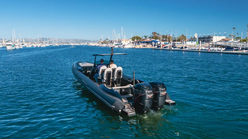 Slide: The Image of 2019 Technohull 34 Sea DNA 999 boat cruising in a marina. - 9