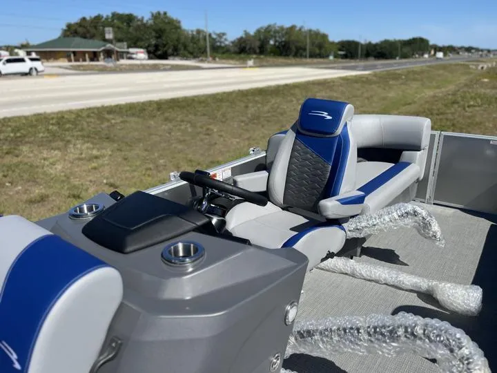 Slide: The Image of 2024 Bennington S 20 SSR boat interior with steering console and seating. - 14