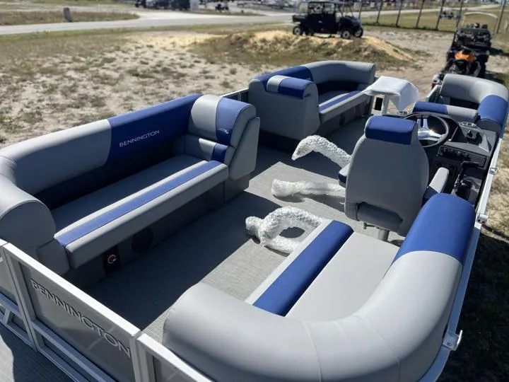 Slide: The Image of 2024 Bennington S 20 SSR pontoon boat with spacious seating and modern design. - 18