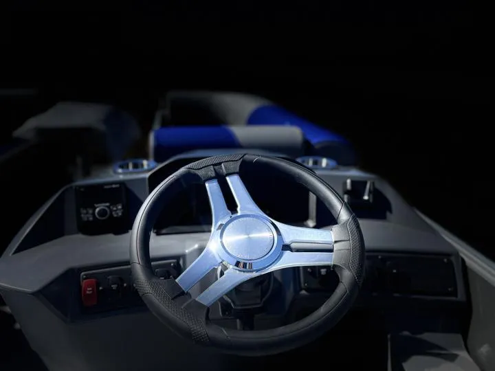 Slide: The Image of 2024 Bennington S 20 SSR boat steering wheel and dashboard. - 25
