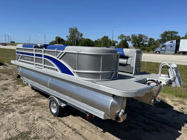 Slide: The Image of 2024 Bennington S 20 SSR pontoon boat on a trailer. - 5
