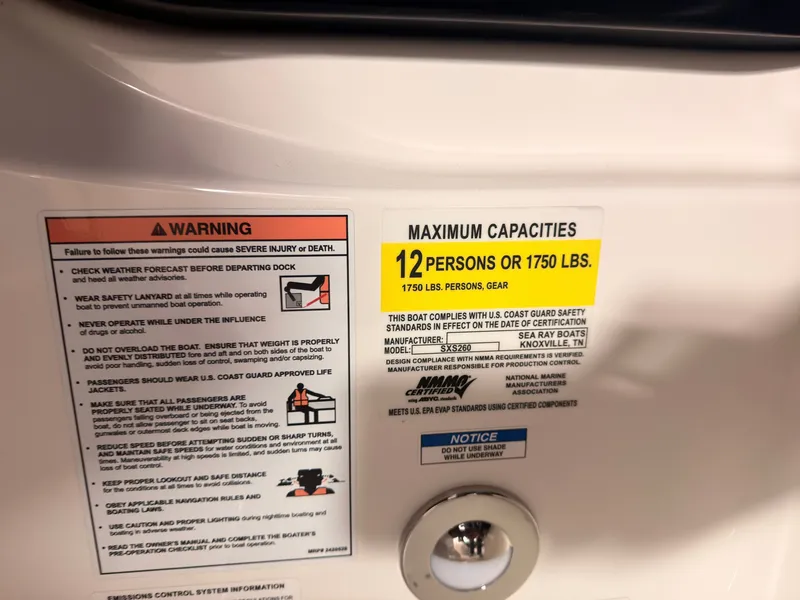 Slide: The Image of Warning and capacity label on a boat, allowing 12 persons or 1750 pounds. - 39