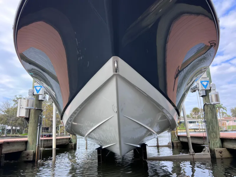 Slide: The Image of 2020 Crevalle 26 HCO Yamaha 300 boat on lift, front view. - 15