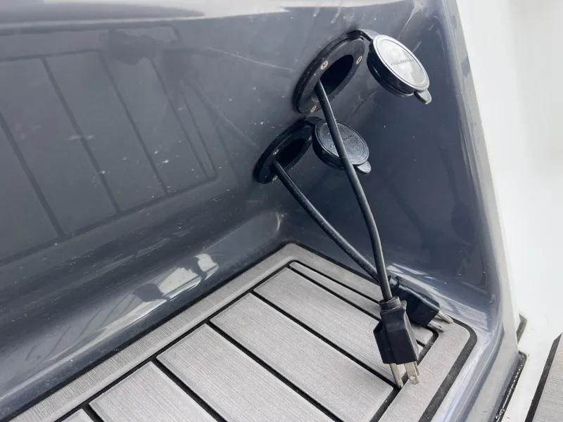 Slide: The Image of Power outlets and cables on a 2020 Crevalle 26 HCO Yamaha 300 boat. - 35