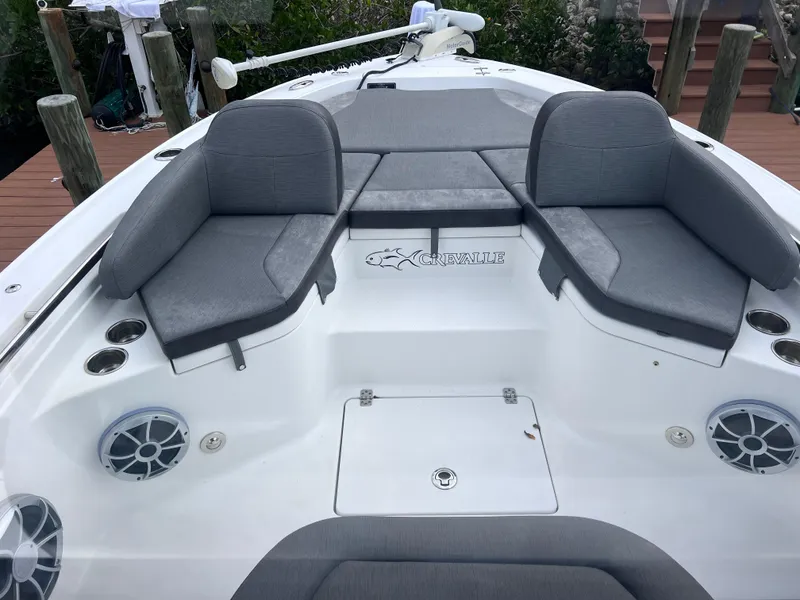 Slide: The Image of 2020 Crevalle 26 HCO Yamaha 300 boat with gray seating and deck speakers. - 36