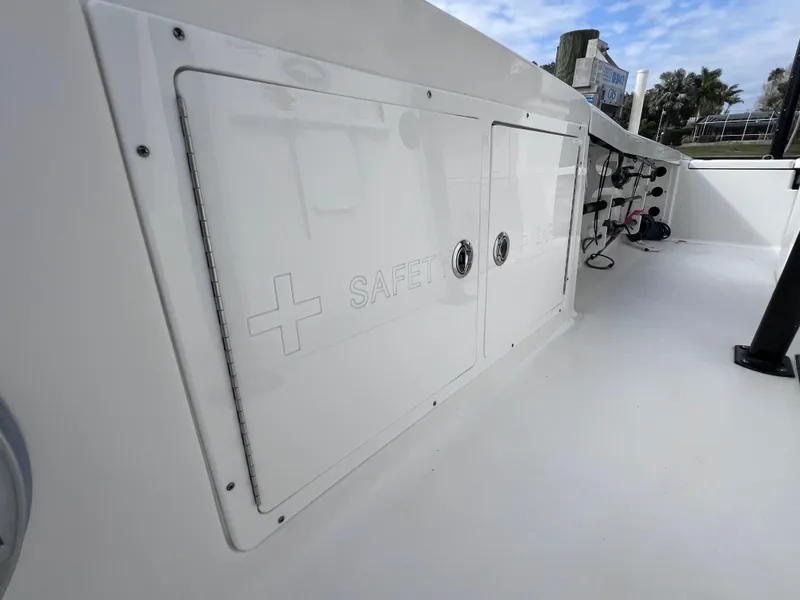 Slide: The Image of 2020 Crevalle 26 HCO Yamaha 300 boat safety storage compartment. - 44