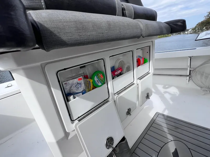 Slide: The Image of Storage compartments on a 2020 Crevalle 26 HCO Yamaha 300 boat. - 45
