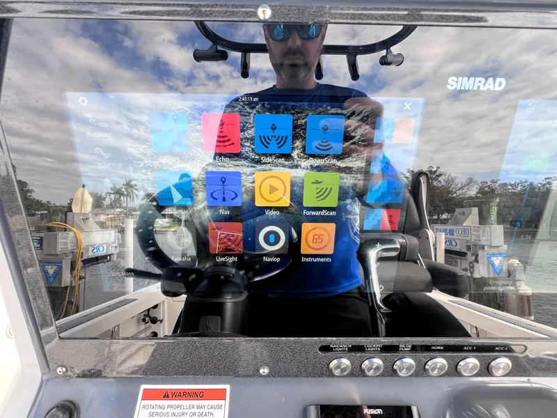 Slide: The Image of 2020 Crevalle 26 HCO Yamaha 300 boat dashboard with Simrad display. - 46