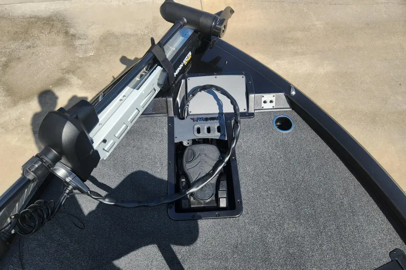 Slide: The Image of 2024 Vexus AVX2080 boat deck with trolling motor and foot pedal. - 2