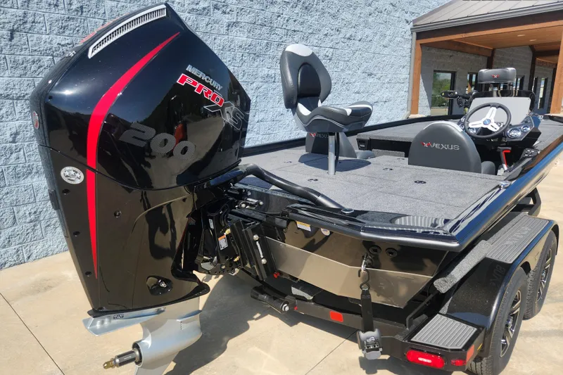 Slide: The Image of 2024 Vexus AVX2080 boat with Mercury Pro XS 200 engine, rear view. - 7