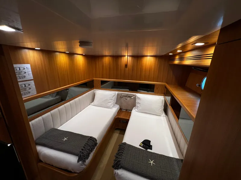 Slide: The Image of Luxurious twin cabin interior of 2006 Sanlorenzo SL72 yacht with wooden finish. - 15
