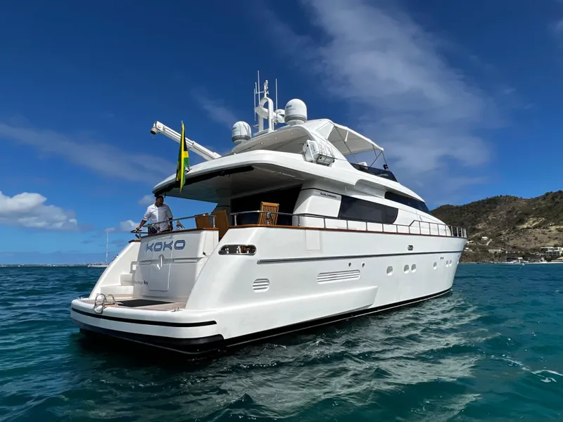 Slide: The Image of Sanlorenzo SL72 2006 yacht on clear blue water with scenic background. - 20