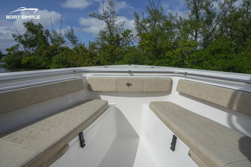 Slide: The Image of 2023 Sea Pro 219 Deep V CC boat interior with cushioned seating - 6