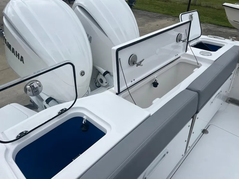 Slide: The Image of 2024 Everglades 285 Center Console with dual Yamaha outboard engines. - 13