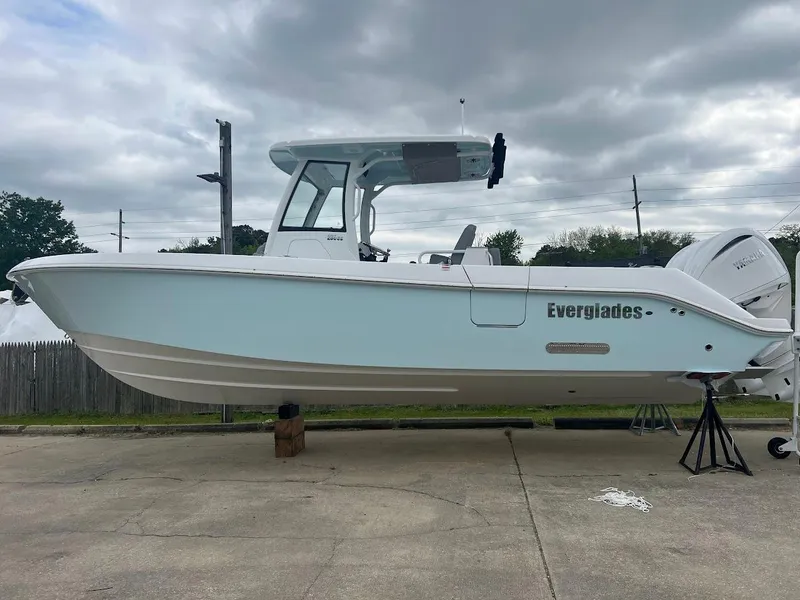 Slide: The Image of 2024 Everglades 285 Center Console boat on display outdoors. - 3
