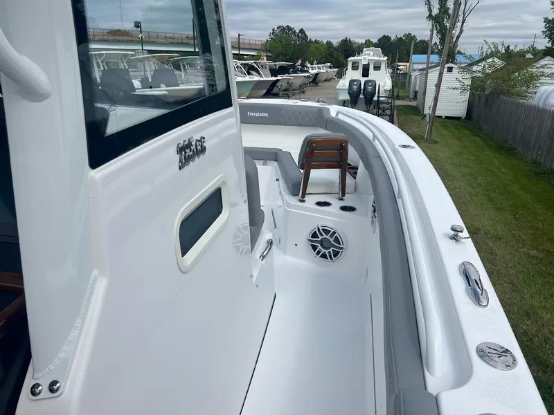 Slide: The Image of 2024 Everglades 285 Center Console boat, side view with seating and speakers. - 30